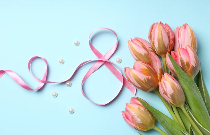 womens-day-march-8th-tulips-ribbon-pearls-blue-background-5k-2880x1800-7590(1).jpg